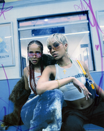 model wearing shield frame. The metal bridge is on the bottom of the continuous lens, thus its name, reverse. pink faded lens and pink metal